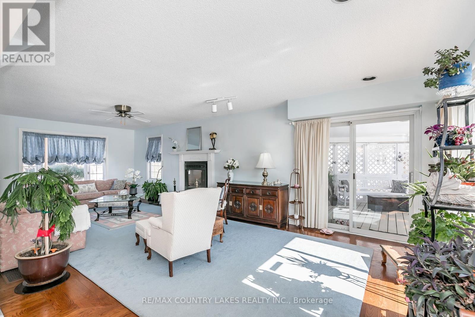 98 Turtle Path, Ramara, ON - Indoor Photo Showing Living Room With Fireplace