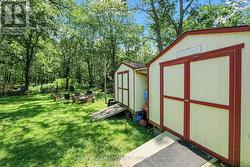 Two of the outdoor sheds in backyard -