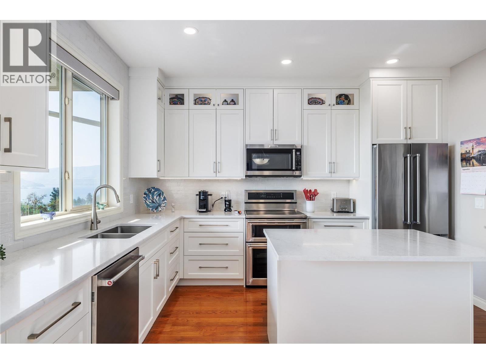 5165 Trepanier Bench Road Unit# 229, Peachland, BC - Indoor Photo Showing Kitchen With Stainless Steel Kitchen With Double Sink With Upgraded Kitchen