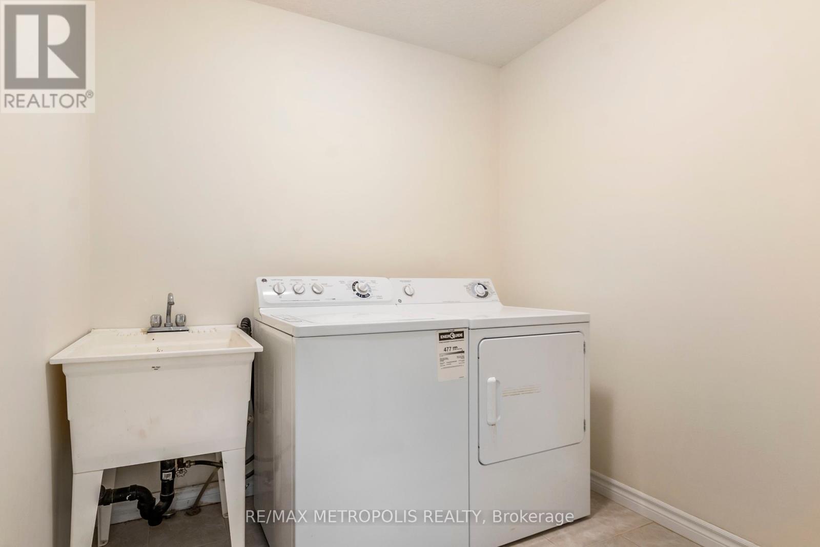 C15 - 619 Wild Ginger Avenue, Waterloo, ON - Indoor Photo Showing Laundry Room
