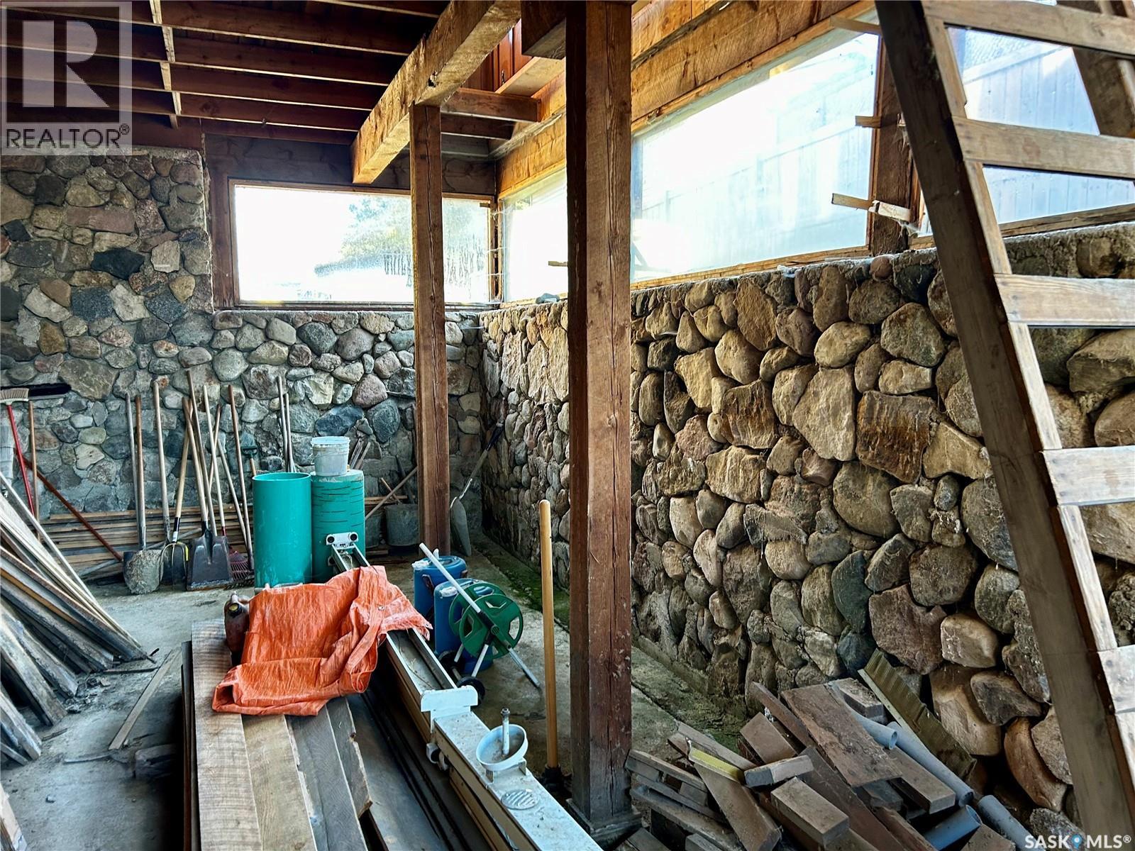 9 Mccordick Street, Shields, SK - Indoor Photo Showing Other Room With Fireplace