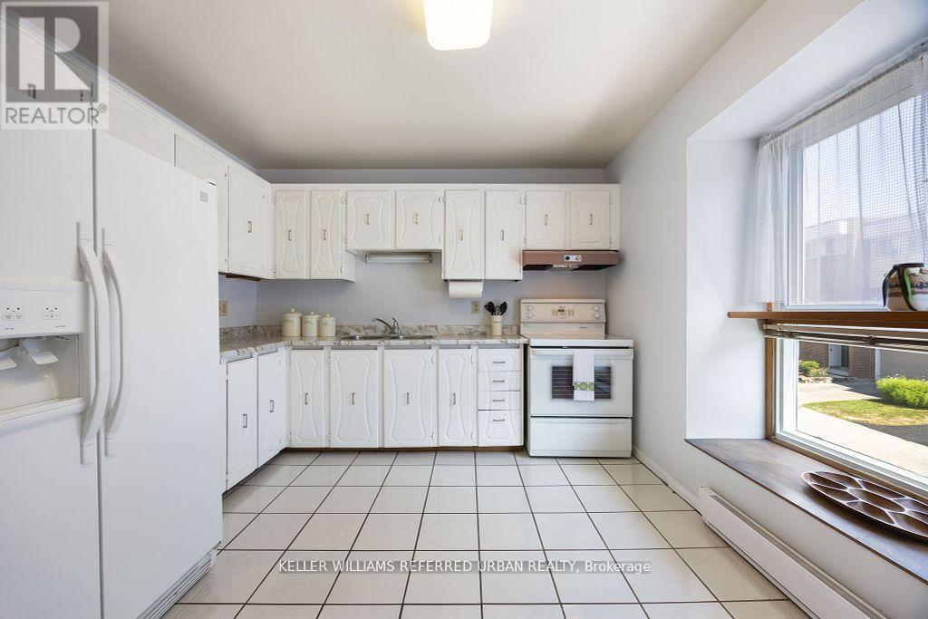 2 Sebastian Cabot Way, Toronto, ON - Indoor Photo Showing Kitchen With Double Sink