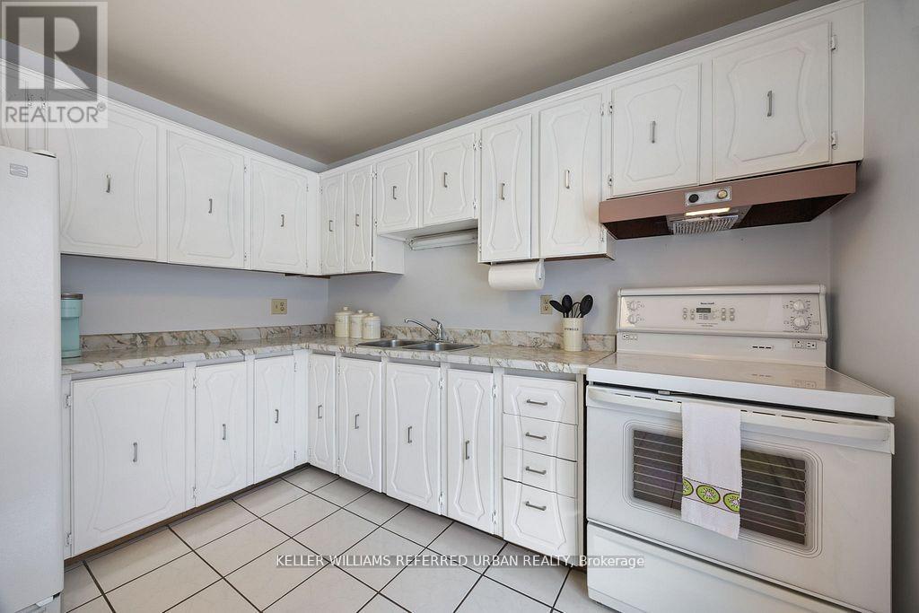 2 Sebastian Cabot Way, Toronto, ON - Indoor Photo Showing Kitchen With Double Sink