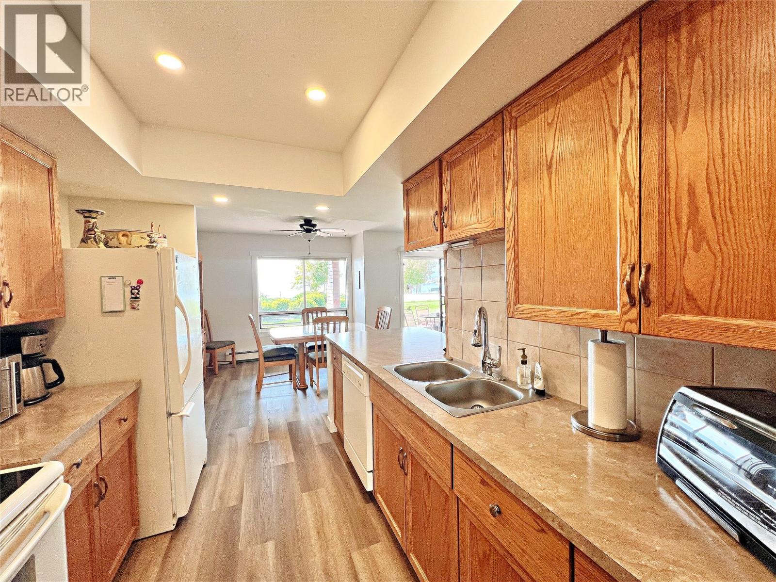 4340A Beach Avenue Unit# 102, Peachland, BC - Indoor Photo Showing Kitchen With Double Sink