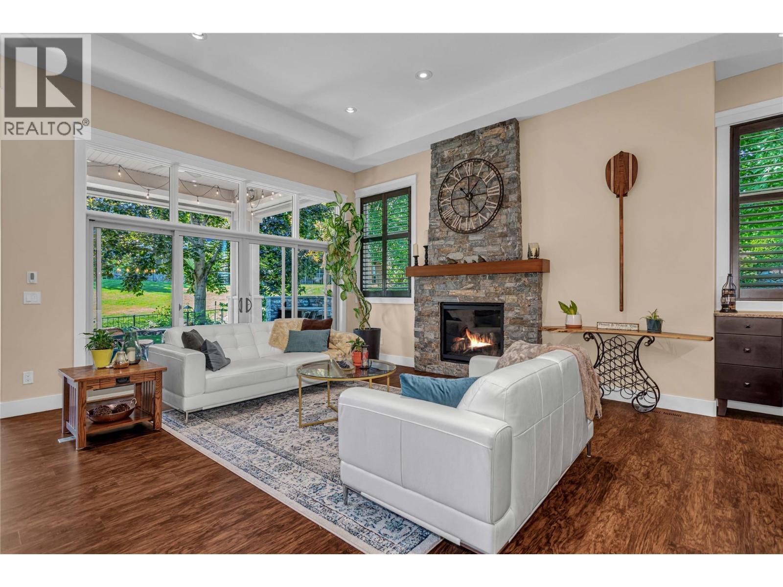 4157 Gallaghers Parkland Drive, Kelowna, BC - Indoor Photo Showing Living Room With Fireplace
