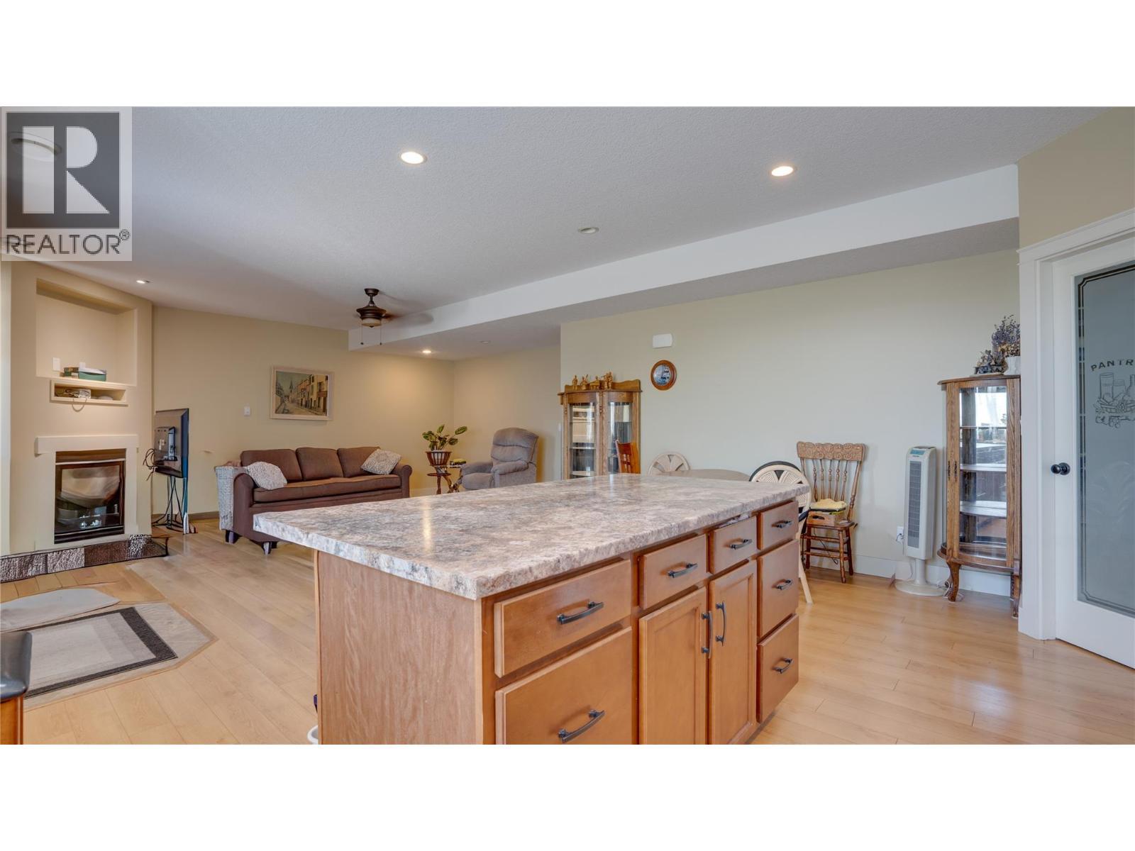 Suite - 567 Mt Ida Drive, Coldstream, BC - Indoor With Fireplace