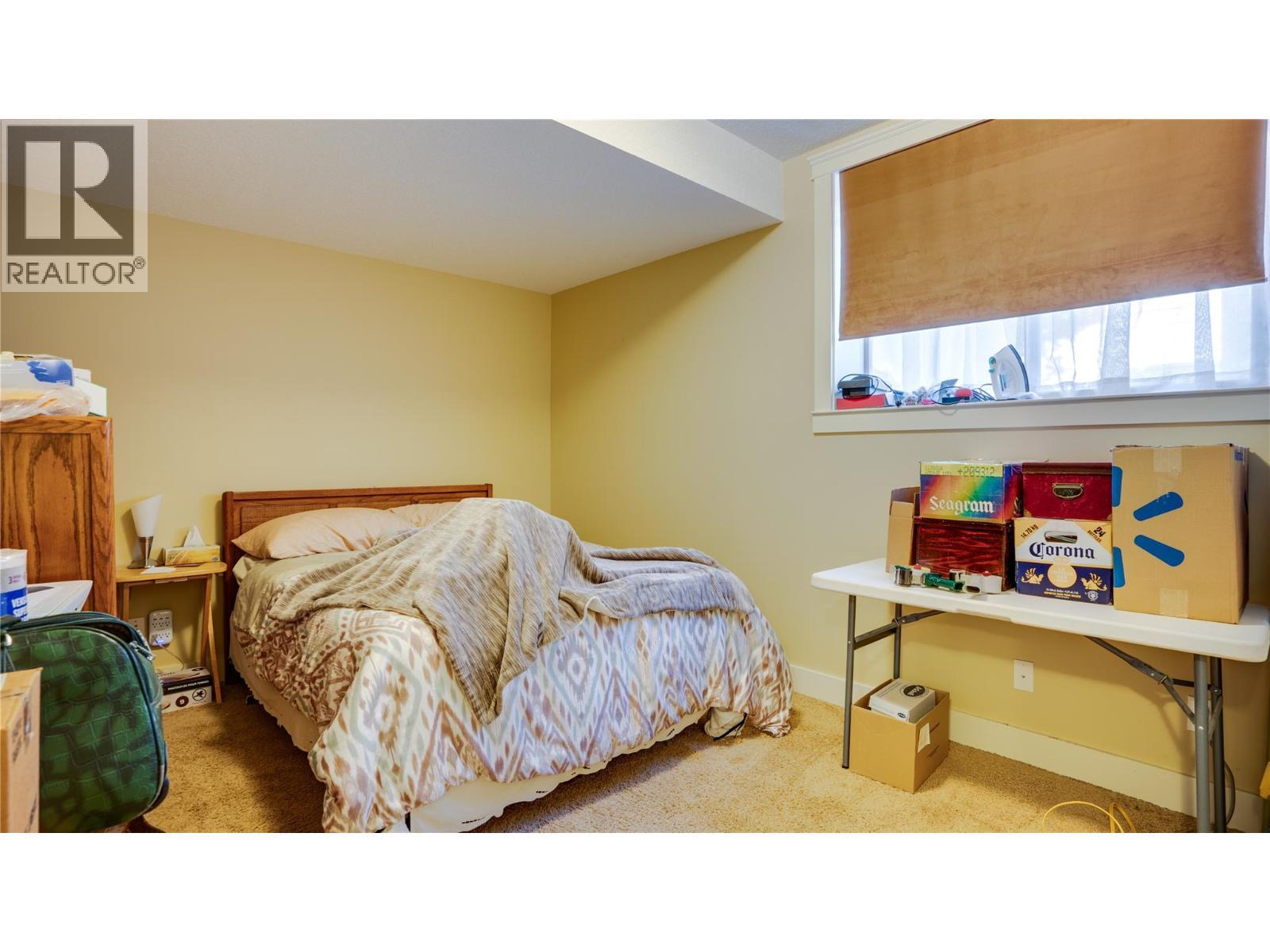 Suite - 567 Mt Ida Drive, Coldstream, BC - Indoor Photo Showing Bedroom