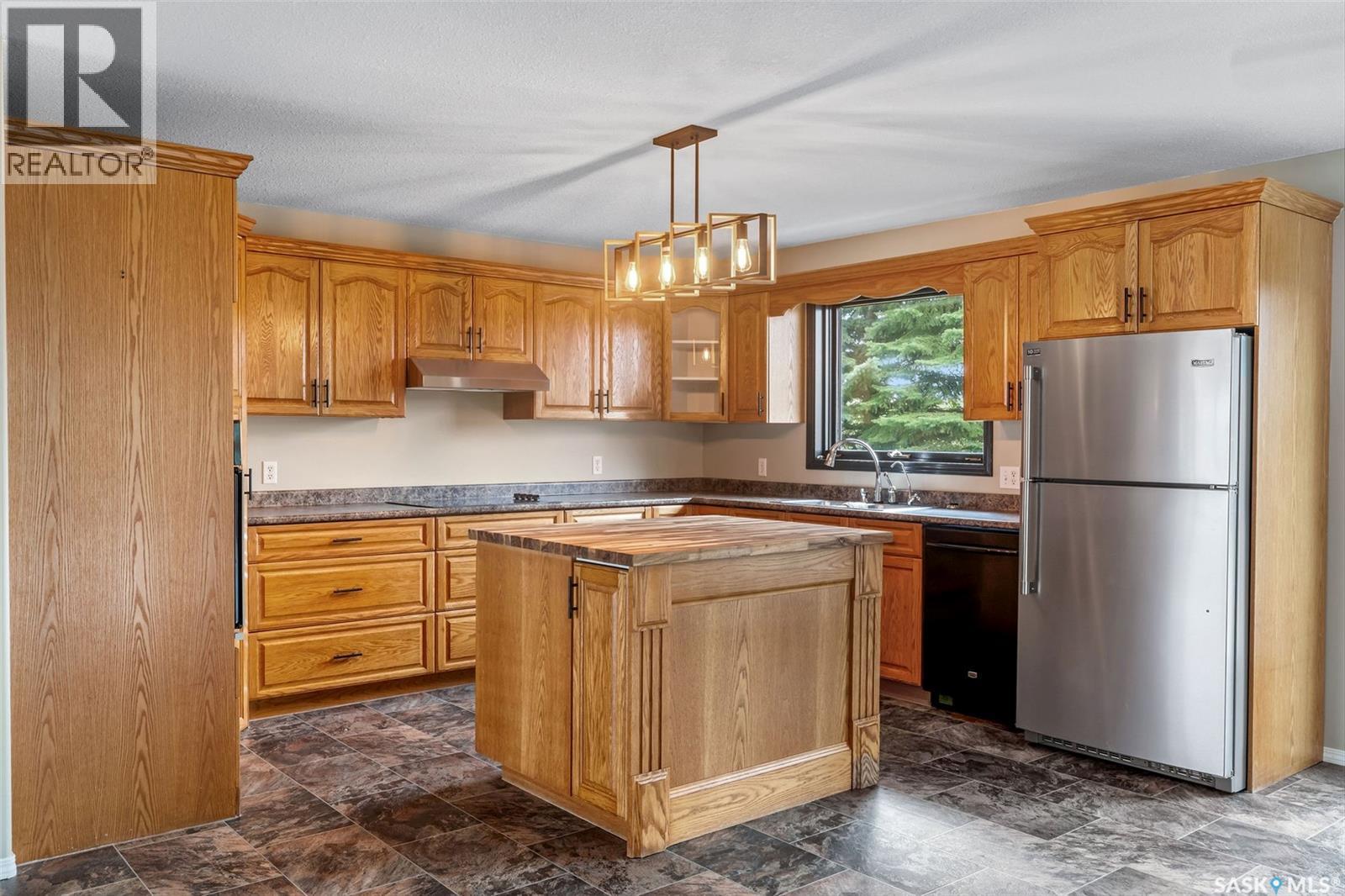 14 Poplar Drive, Birch Hills, SK - Indoor Photo Showing Kitchen With Double Sink