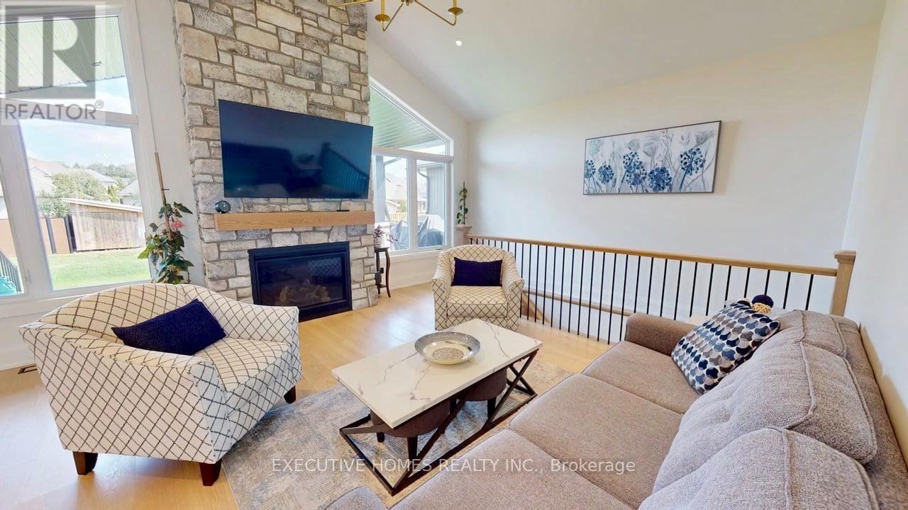 214 Irishwood Lane, Brockton, ON - Indoor Photo Showing Living Room With Fireplace