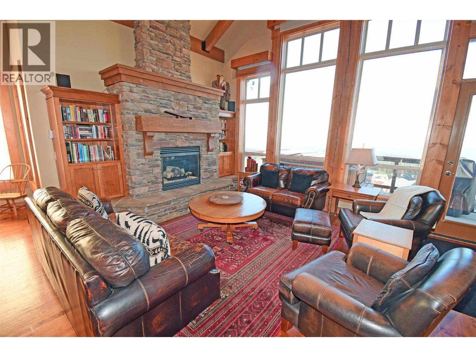 350 Whitehorse Lane Unit# 1 Lot# 1, Big White, BC - Indoor Photo Showing Living Room With Fireplace