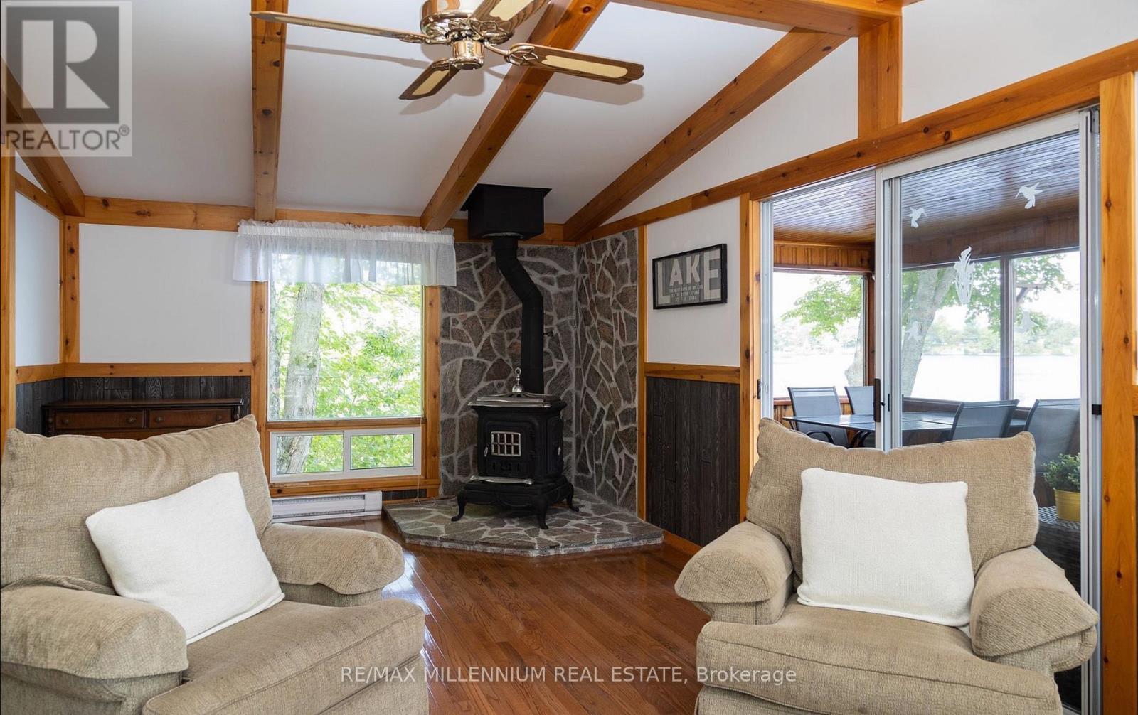 124 - 695 High Way, Mckellar, ON - Indoor Photo Showing Living Room With Fireplace