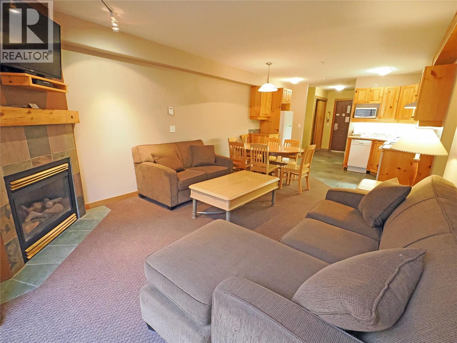 5335 Big White Road Unit# 303/305, Big White, BC - Indoor Photo Showing Living Room With Fireplace