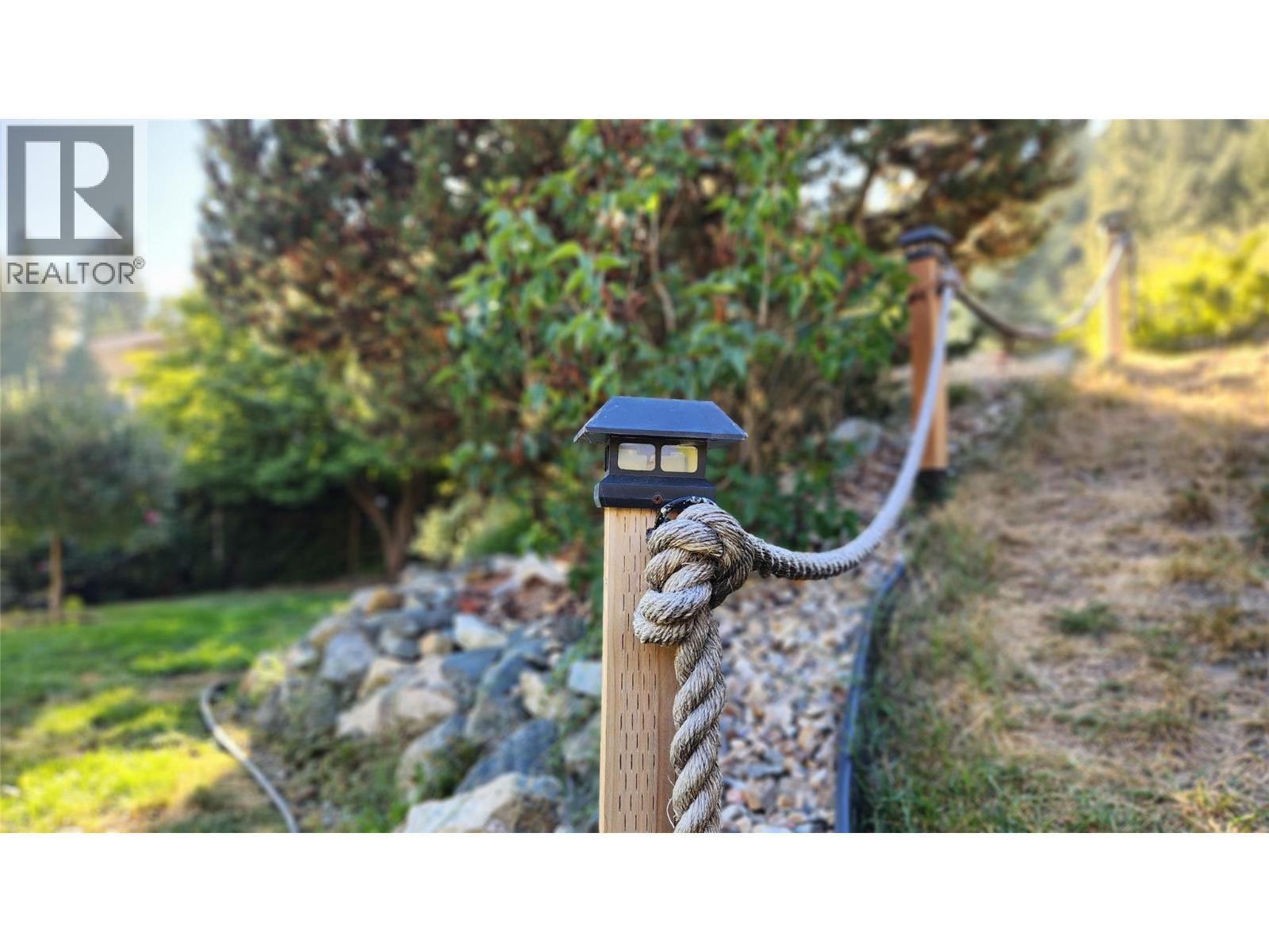 REAR YARD - Leading to Upper Terrace & Garden - 3065 Lakeview Cove Road, West Kelowna, BC - Outdoor