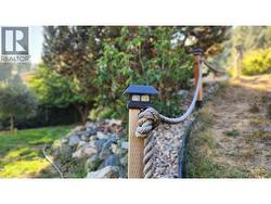 REAR YARD - Leading to Upper Terrace & Garden -