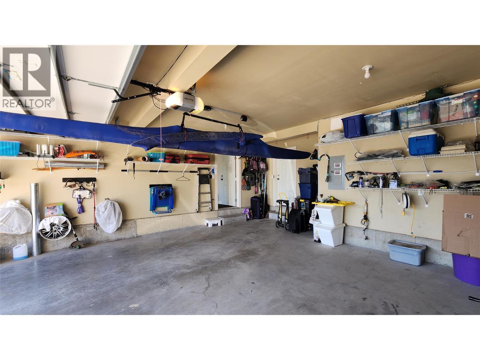 GROUND FLOOR - Double Garage - 3065 Lakeview Cove Road, West Kelowna, BC - Indoor Photo Showing Garage