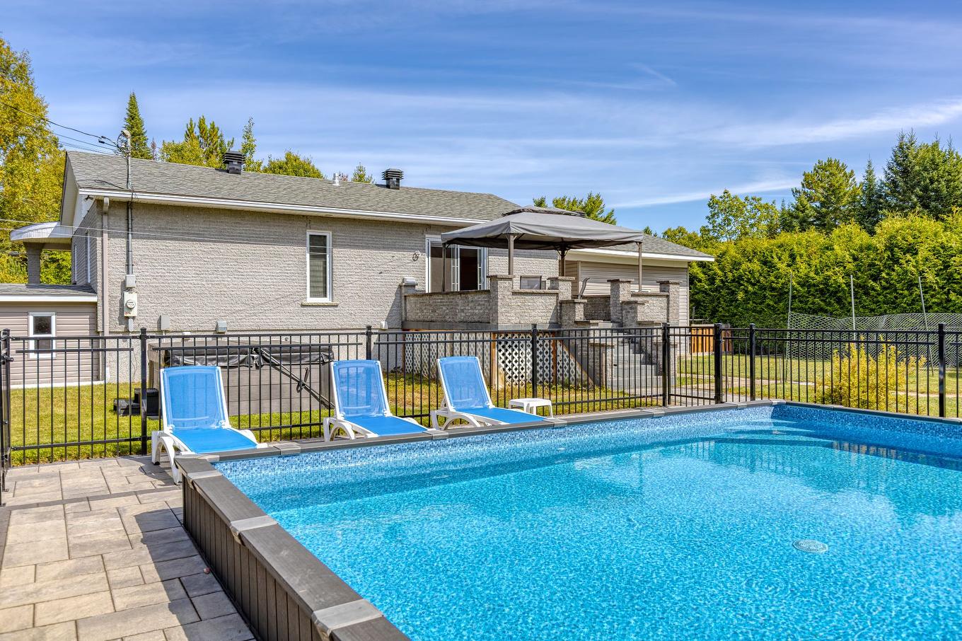 Face arrière - 161 Rue St-Paul, Saint-Côme, QC - Outdoor With Above Ground Pool