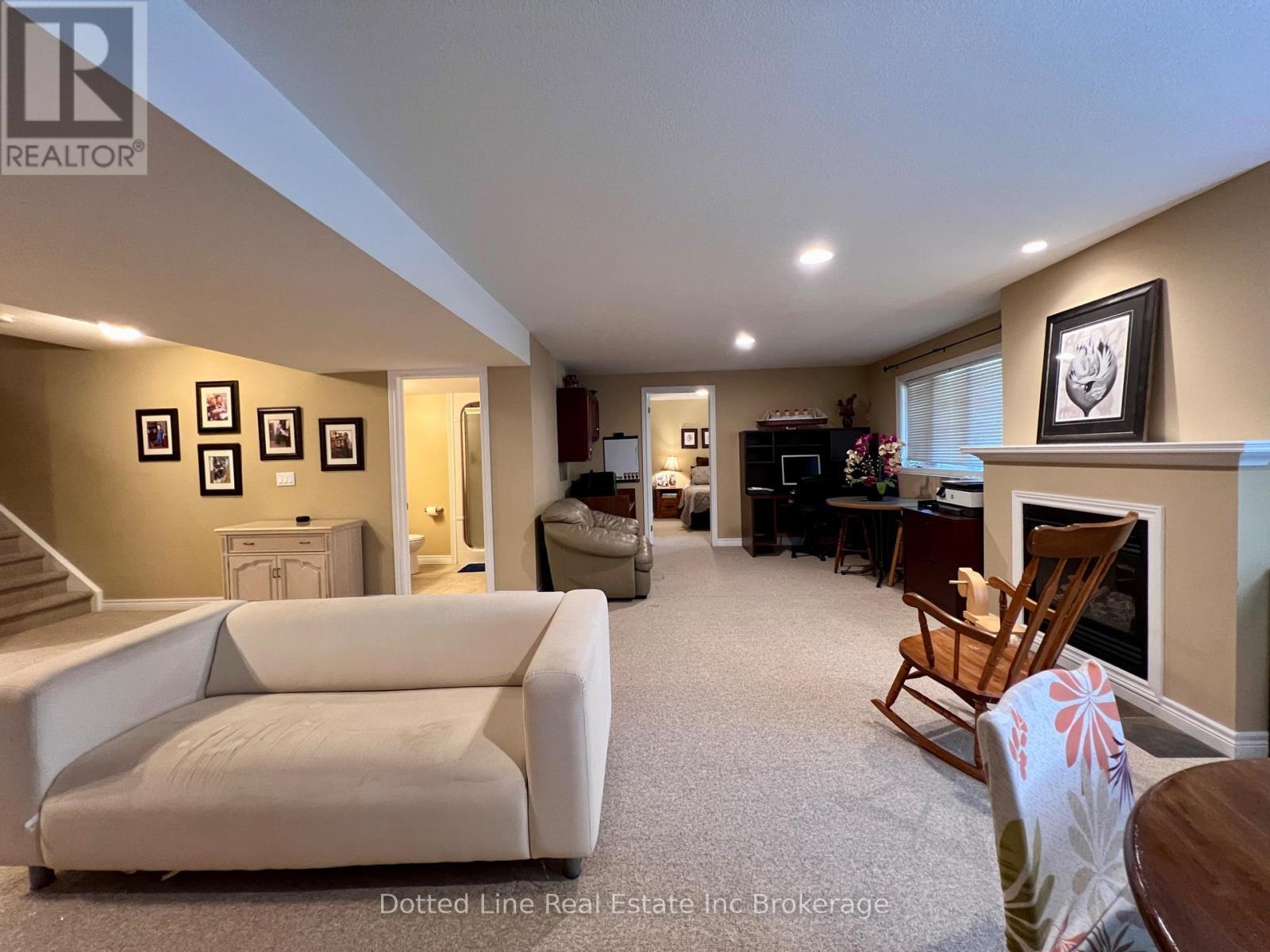 Lower Family Room - 11 - 500 Lakeview Drive, Woodstock (Woodstock - North), ON - Indoor With Fireplace