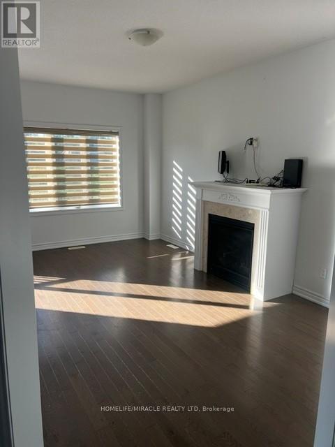 305 Hagane Street, Southgate, ON - Indoor Photo Showing Living Room With Fireplace