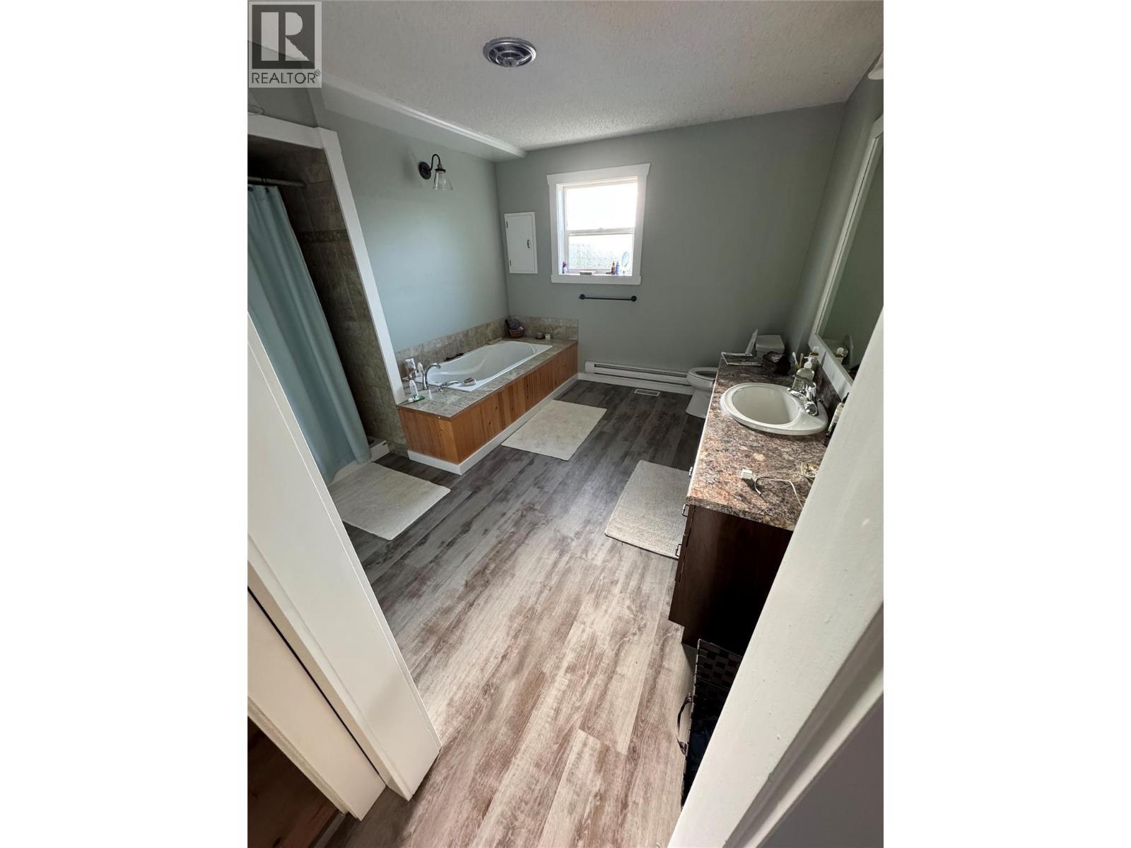 New Flooring in Bathrooms Upstairs - 10108 Venables Drive, Coldstream, BC -