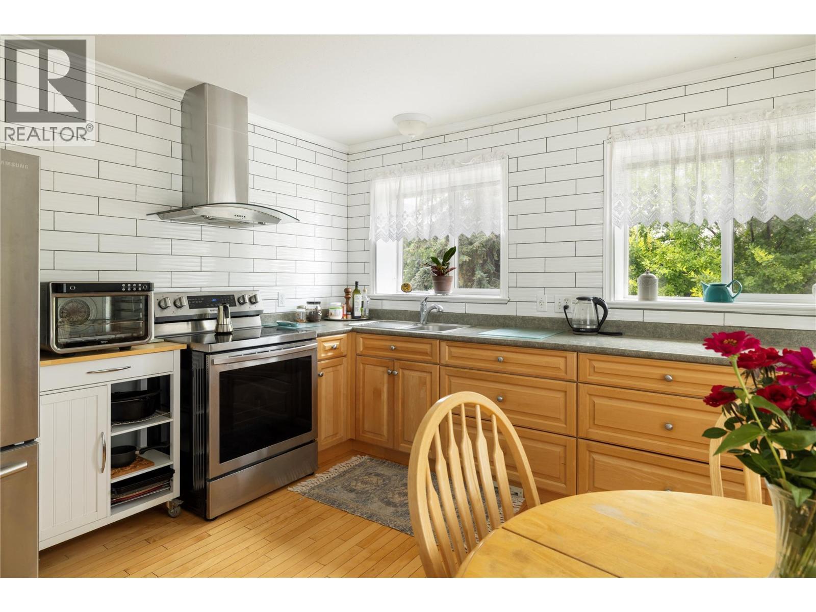Bright open kitchen. - 10108 Venables Drive, Coldstream, BC - Indoor Photo Showing Other Room