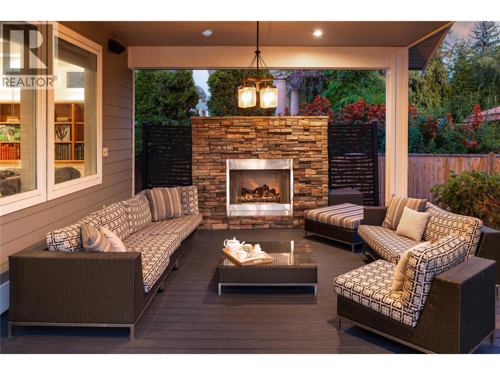 529 Knowles Road, Kelowna, BC - Outdoor With Fireplace With Deck Patio Veranda With Exterior