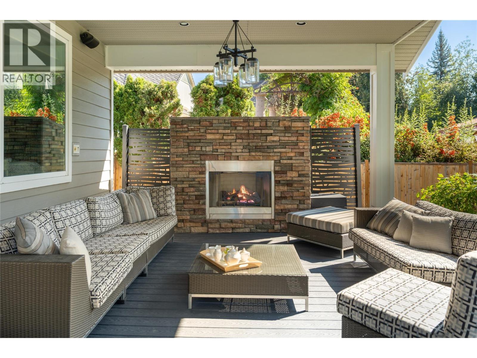 529 Knowles Road, Kelowna, BC - Outdoor With Fireplace With Deck Patio Veranda With Exterior