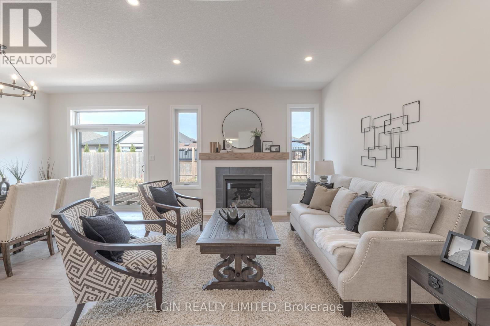 42197 Mcbain Line, Central Elgin, ON - Indoor Photo Showing Living Room With Fireplace