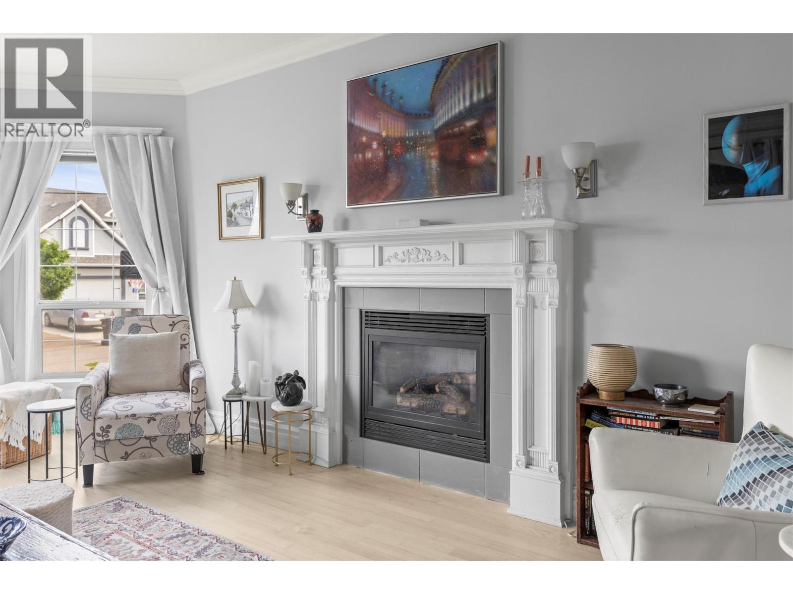 859 Mt. Bulman Place, Vernon, BC - Indoor Photo Showing Living Room With Fireplace