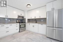 Updated Kitchen with Stainless Steel Appliances -