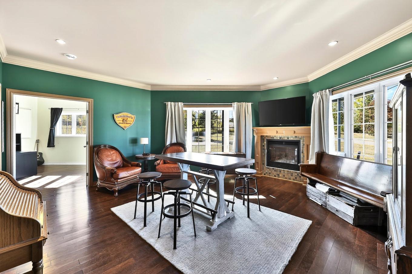 Salle familiale - 1049 Rue Des Chevaliers, Prévost, QC - Indoor Photo Showing Living Room With Fireplace