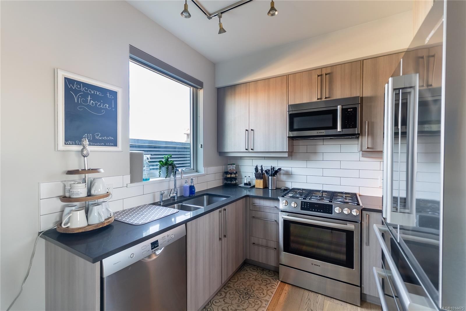 411-595 Pandora Ave, Victoria, BC - Indoor Photo Showing Kitchen With Double Sink