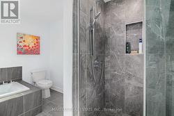 Upgraded to glass shower, quartz counter top 2024 -