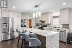 Centre island with breakfast counter top -