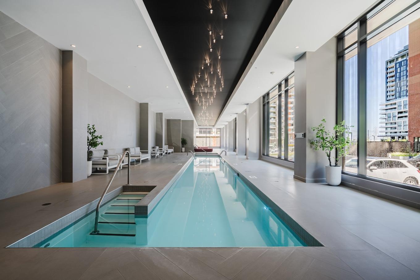 Pool - 1602-5505 Boul. Du Quartier, Brossard, QC - Indoor Photo Showing Other Room With In Ground Pool