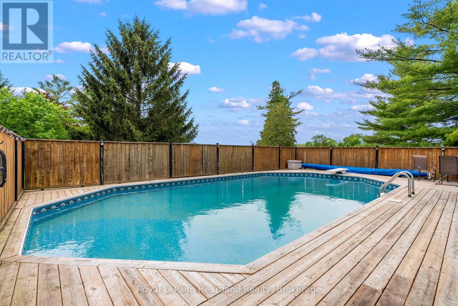 1047 Gibson Street, Howick, ON - Outdoor With Above Ground Pool With Deck Patio Veranda With Backyard