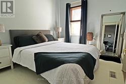 Primary Bedroom with Large Window -