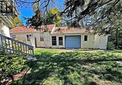 Drive Shed behind deep Garage -