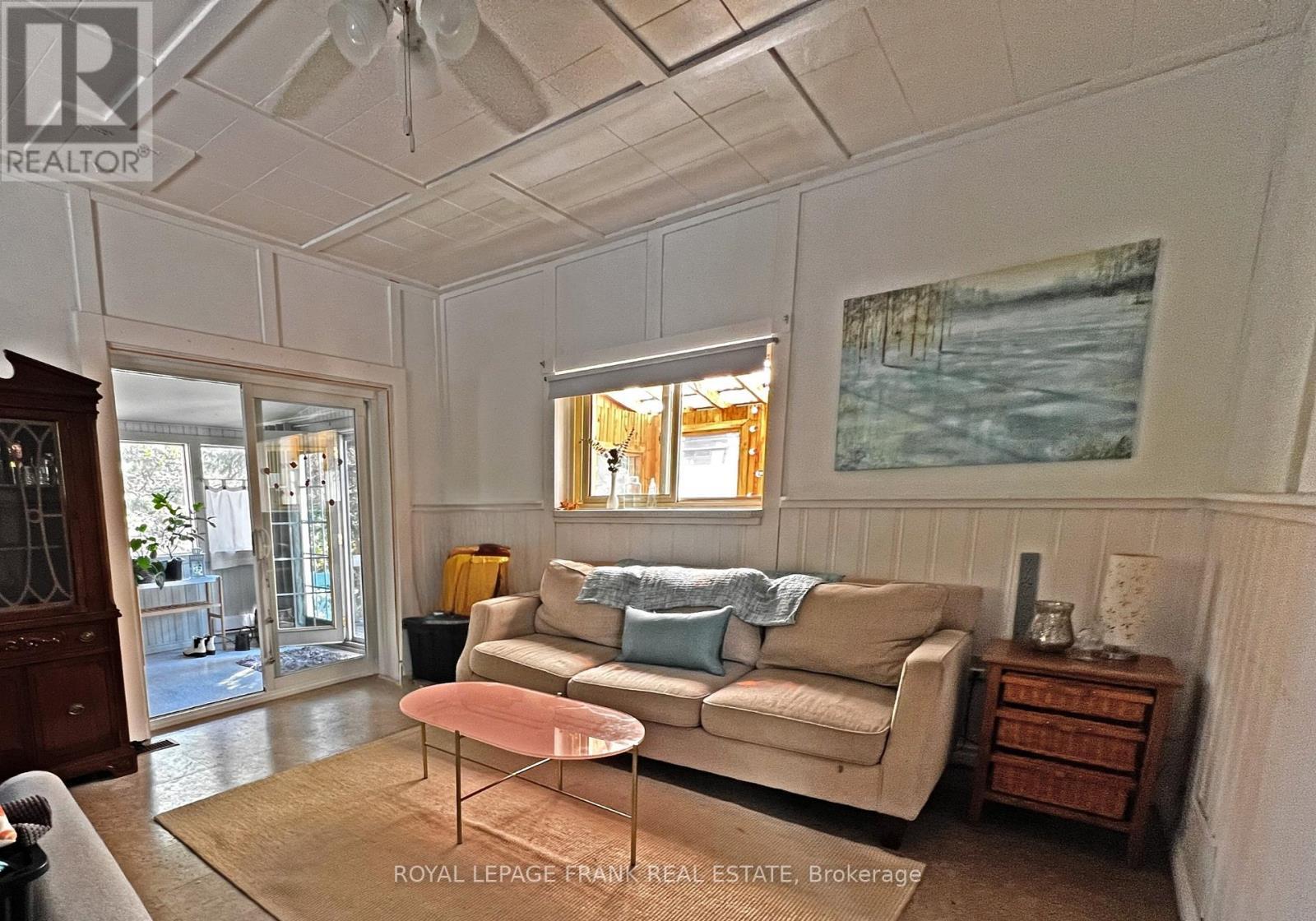 Living Room with Wood Fireplace - 4420 County Rd 29, Douro-Dummer, ON - Indoor Photo Showing Living Room