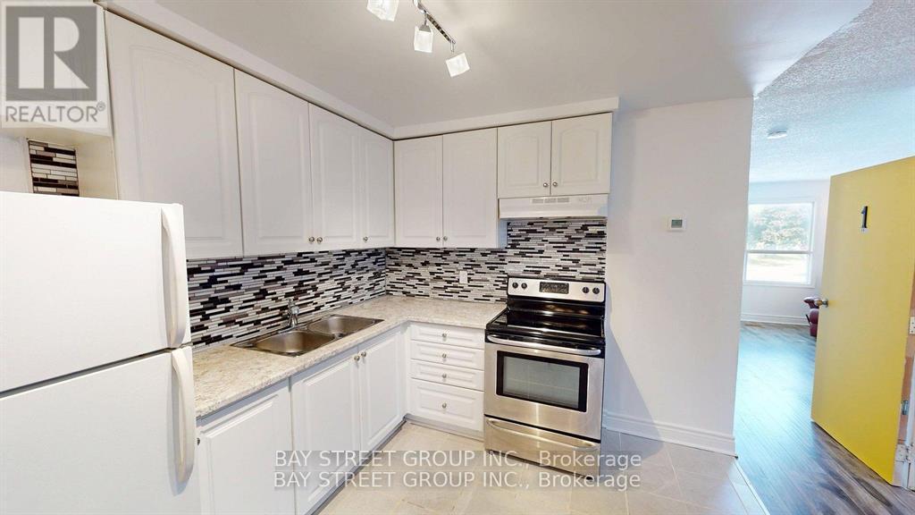 1 - 1448 Outlet Drive, Oshawa, ON - Indoor Photo Showing Kitchen With Double Sink