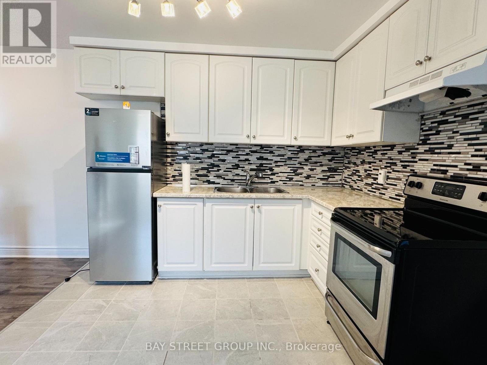 1 - 1448 Outlet Drive, Oshawa, ON - Indoor Photo Showing Kitchen With Double Sink