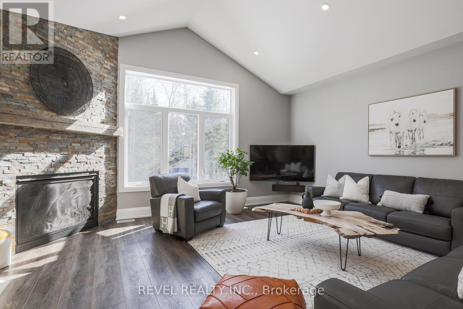99 Kagawong Road, Kawartha Lakes (Fenelon), ON - Indoor Photo Showing Living Room With Fireplace