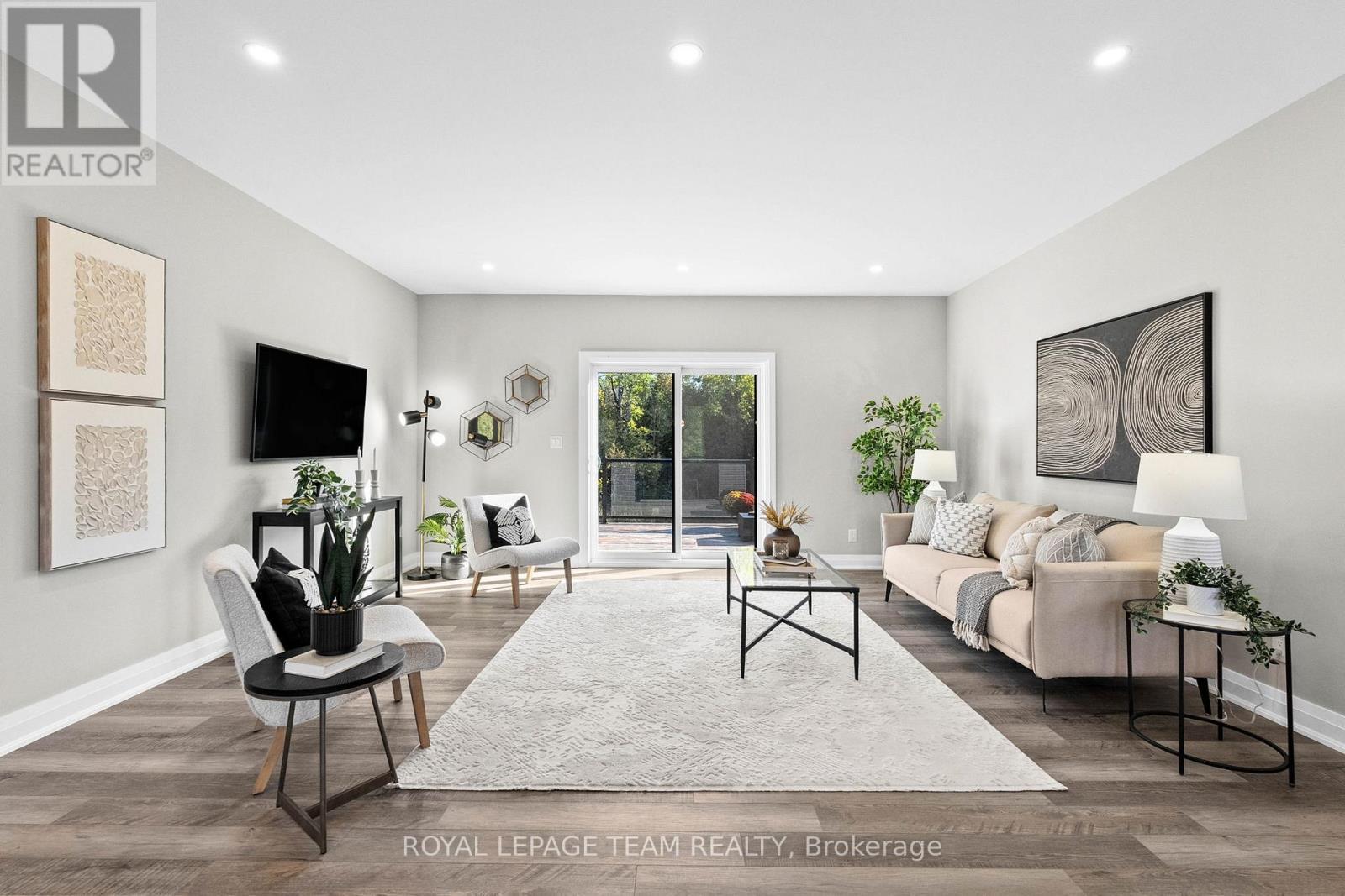 Main living room with sliders to back deck - 2850 Montague Boundary Road, Ottawa, ON - Indoor Photo Showing Living Room