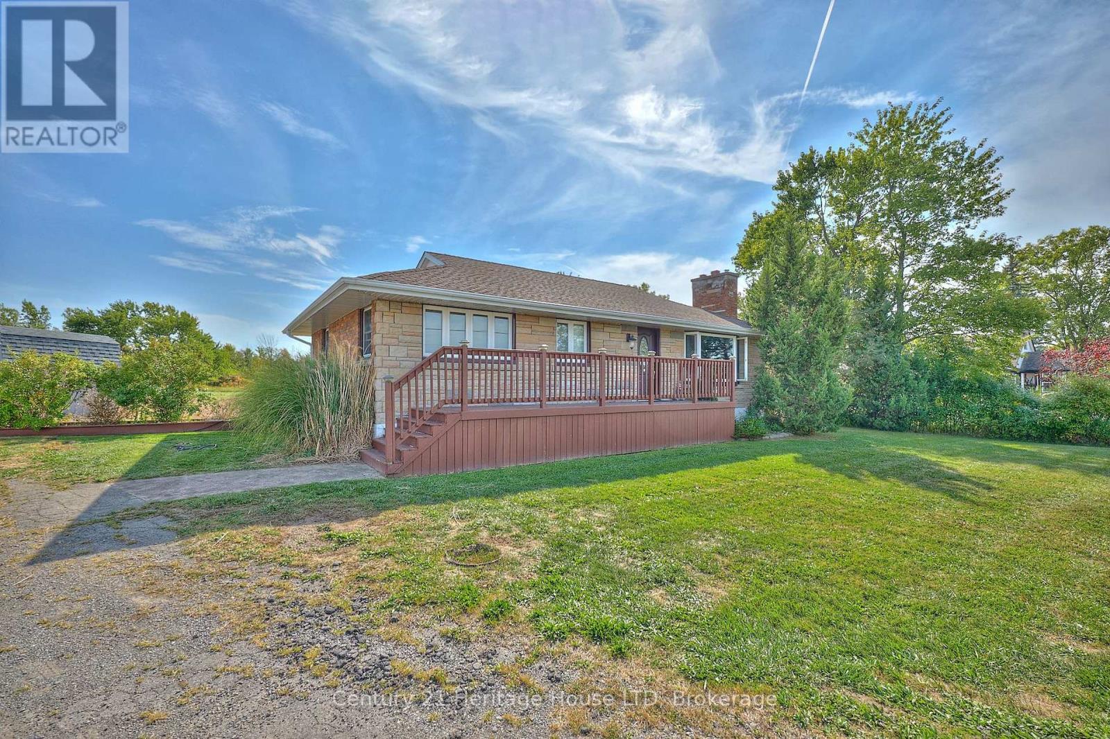 Side view of the residential property - 3551 Garrison Road, Fort Erie (Ridgeway), ON