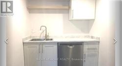 Bachelor apartment basement kitchen -