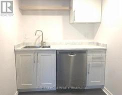 Bachelor apartment basement kitchen -