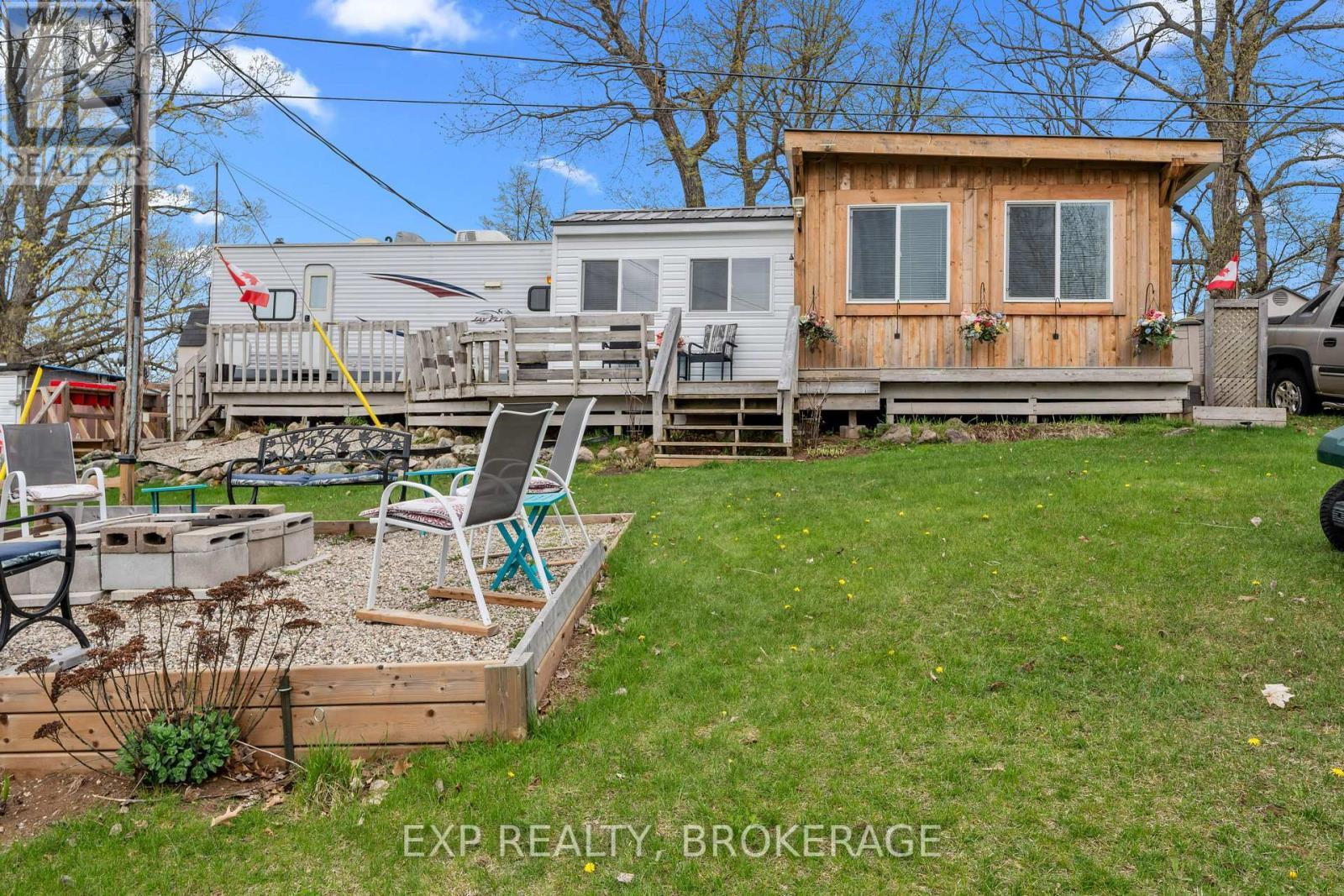 38 - 9 Glenford Lane, Frontenac (Frontenac South), ON - Outdoor With Deck Patio Veranda