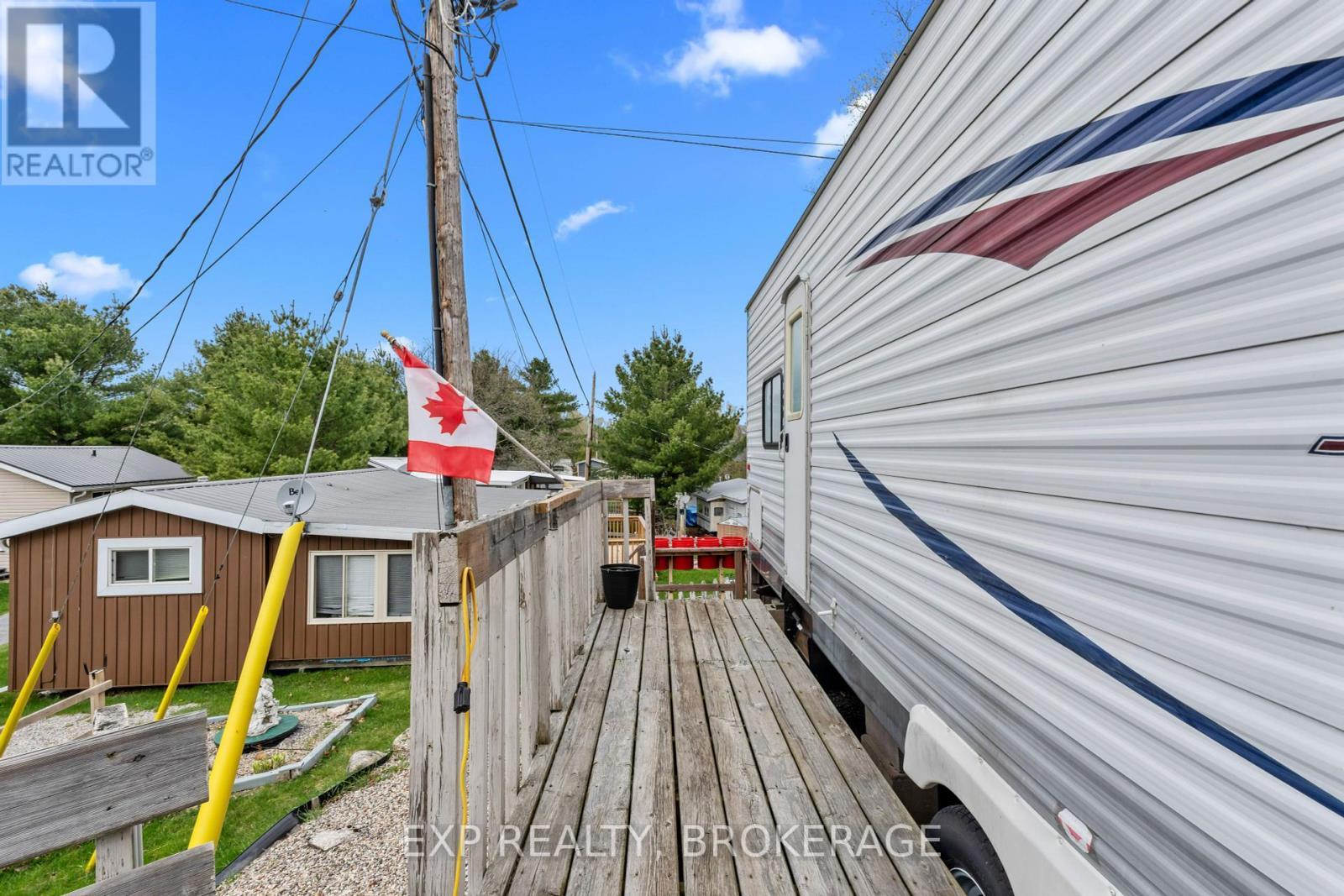 38 - 9 Glenford Lane, Frontenac (Frontenac South), ON - Outdoor With Exterior