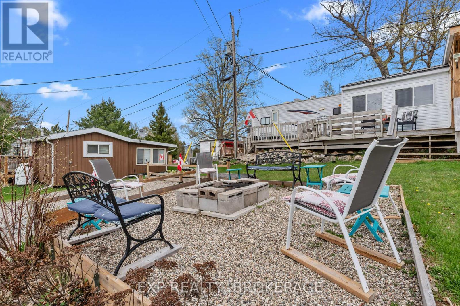 38 - 9 Glenford Lane, Frontenac (Frontenac South), ON - Outdoor With Deck Patio Veranda