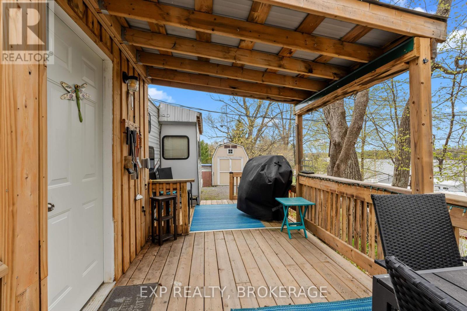 38 - 9 Glenford Lane, Frontenac (Frontenac South), ON - With Deck Patio Veranda With Exterior