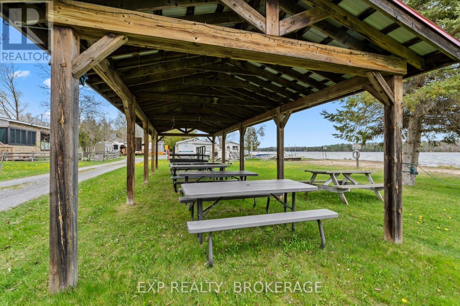 38 - 9 Glenford Lane, Frontenac (Frontenac South), ON - Outdoor With Deck Patio Veranda